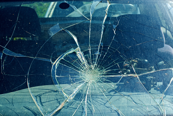 the broken windshield in motor vehicle accident